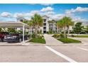 Community features covered parking and lush landscaping at 14131 Heritage Landing Blvd # 838, Punta Gorda, FL 33955