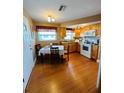Cozy kitchen with light wood cabinets, and breakfast nook at 7739 38Th N Pl, St Petersburg, FL 33709
