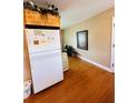 Bright kitchen features wood cabinets and modern appliances at 7739 38Th N Pl, St Petersburg, FL 33709