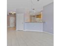 Open concept living room with tile floors and neutral walls at 255 W End Dr # 2201, Punta Gorda, FL 33950