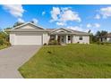 Charming single-story home with a two-car garage at 9461 Attica Cir, Port Charlotte, FL 33981