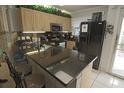Updated kitchen with granite countertops and stainless steel appliances at 26485 Rampart Blvd # D6, Punta Gorda, FL 33983