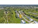 Aerial view showcasing the home's location in a residential neighborhood at 22557 Bolanos Ct, Port Charlotte, FL 33952