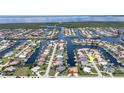 Aerial view of waterfront home and community at 2511 Rio Largo Ct, Punta Gorda, FL 33950