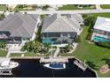 Aerial view of canal-front property with private boat dock at 2511 Rio Largo Ct, Punta Gorda, FL 33950