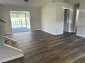 Living room with view of the pool and access to the backyard at 240 Cicero Nw St, Port Charlotte, FL 33948