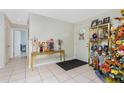 Bright and spacious entryway, decorated for the fall season at 335 Kenova St, Port Charlotte, FL 33954