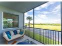 Peaceful screened balcony overlooking a lush green landscape at 14071 Heritage Landing Blvd # 327, Punta Gorda, FL 33955