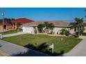 Single-story home with tile roof and manicured lawn at 729 Macedonia Dr, Punta Gorda, FL 33950