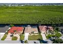 Waterfront property with boat dock and tropical surroundings at 729 Macedonia Dr, Punta Gorda, FL 33950