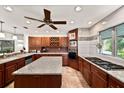 Spacious kitchen featuring granite countertops and ample cabinetry at 4460 Northshore Dr, Punta Gorda, FL 33980