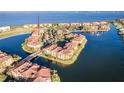 Condo community nestled on the water, showcasing resort-style living at 95 Vivante Blvd # 9542, Punta Gorda, FL 33950