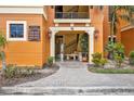 Well-maintained condo entrance with landscaping and building number at 95 Vivante Blvd # 9542, Punta Gorda, FL 33950