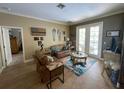 Spacious living room with French doors leading to patio at 4088 Felhorn St, Port Charlotte, FL 33948