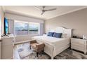 Bright bedroom with a king-size bed and waterfront views at 200 Harbor Walk Dr # 243, Punta Gorda, FL 33950