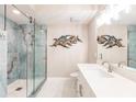 Modern bathroom with walk-in shower and marble tile at 200 Harbor Walk Dr # 243, Punta Gorda, FL 33950