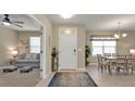 Bright and airy entryway with views to living and dining areas at 1530 Laurel Brook Ln, Port Charlotte, FL 33953