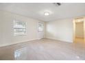 Bright living room with tile floors and lots of natural light at 2624 Lee St, Punta Gorda, FL 33950