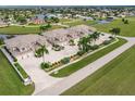 Aerial view of four townhouses near water at 17084 Acapulco Rd # 222, Punta Gorda, FL 33955