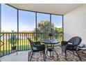 Relaxing screened balcony overlooking a tranquil lake view at 175 Kings Hwy # B6-526, Punta Gorda, FL 33983