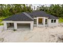 Aerial view of a new construction home with a large lot at 2502 Pinewood St, North Port, FL 34288