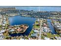 Wide aerial showcasing the property's waterfront location and neighborhood at 156 Morgan Se Ln, Port Charlotte, FL 33952