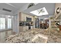 Kitchen features granite countertops and stainless steel appliances at 3494 Yukon Dr, Port Charlotte, FL 33948