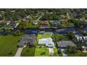 Bird's eye view of canal front home with backyard at 3494 Yukon Dr, Port Charlotte, FL 33948
