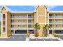 Close up of the condo showing the structure and parking at 101 N Marion Ct # 122, Punta Gorda, FL 33950