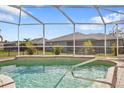 Screened in pool with tiled coping at 2262 Rio De Janeiro Ave, Punta Gorda, FL 33983