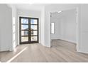 Bright entryway with double doors and view to backyard at 17315 Cape Horn Blvd, Punta Gorda, FL 33955