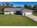 Single-story home with a spacious yard at 18370 Inwood Ave, Port Charlotte, FL 33948