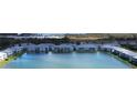 Aerial view of condo community with lakefront access at 3310 Loveland Blvd # 604, Port Charlotte, FL 33980