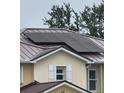 Home features solar panels installed on the roof at 17253 Naiad Ct, Punta Gorda, FL 33955