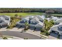 Aerial view of homes near golf course and lake at 14624 Sycamore Ct # 2512, Punta Gorda, FL 33955