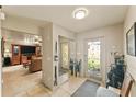 Inviting entryway with view of living room and access to exterior at 543 Lincoln Nw Ave, Port Charlotte, FL 33952
