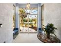 Inviting entryway with mosaic tile floor at 1124 Cheshire St, Port Charlotte, FL 33953