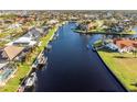 Stunning aerial view of waterfront homes and community at 590 Toulouse Dr, Punta Gorda, FL 33950