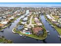 Wide aerial view of home and neighborhood at 1215 Via Tripoli, Punta Gorda, FL 33950