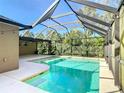 Inviting screened-in pool area, perfect for relaxation and entertainment, complete with sparkling water and ample space at 3316 Kacher Rd, North Port, FL 34288
