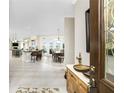 Open concept entryway with views into kitchen and dining areas at 1945 Jamaica Way, Punta Gorda, FL 33950