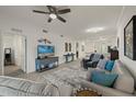 Bright and airy living room with comfy seating and a large TV at 43050 Greenway Blvd # 614, Punta Gorda, FL 33982