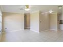Open living area with tile floors and neutral color palette at 21150 Gertrude Ave # A3, Port Charlotte, FL 33952