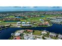 Community overview featuring waterfront property and golf course at 1542 Kinglet Dr, Punta Gorda, FL 33950