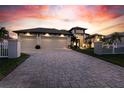 Modern home with three car garage and paver driveway at 17389 Ohara Dr, Port Charlotte, FL 33948