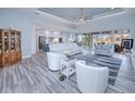 Bright living room features open concept floor plan and hardwood floors at 1450 Kiwi Ct, Punta Gorda, FL 33950