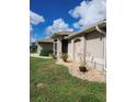 One-story home with a screened porch and landscaped yard at 2250 Villa Green Ave, North Port, FL 34288