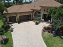 Luxury home showcasing a beautiful facade and landscaping at 3507 Terin Ct, Punta Gorda, FL 33950