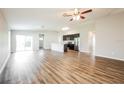 Open concept kitchen with island and stainless steel appliances at 377 Avella St, Port Charlotte, FL 33954