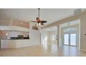 Bright and spacious living room with tile floors and a high ceiling at 8317 Denargo Rd, North Port, FL 34287